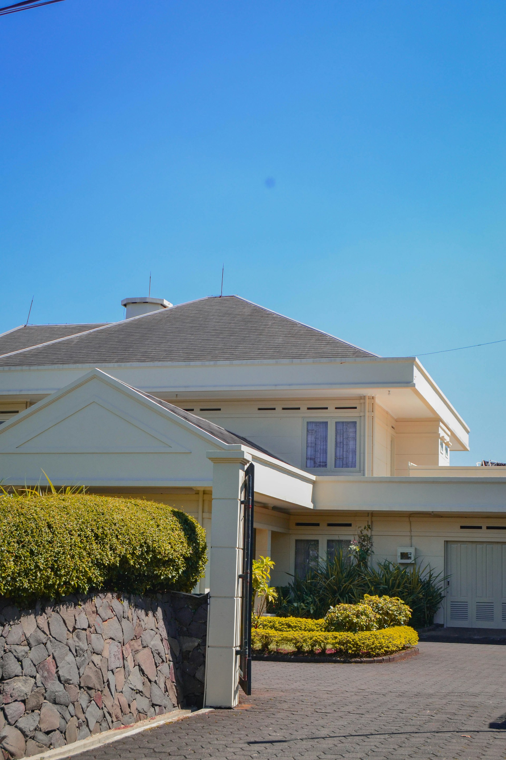 A frontage wall and drive